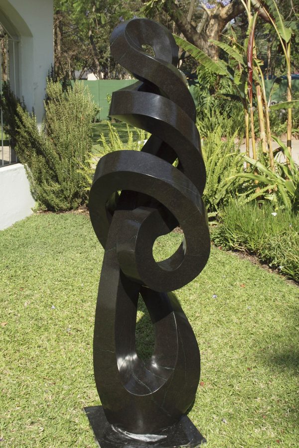 Abstract stone sculpture Happy Moments by Peter Gwisa from Zimbabwe