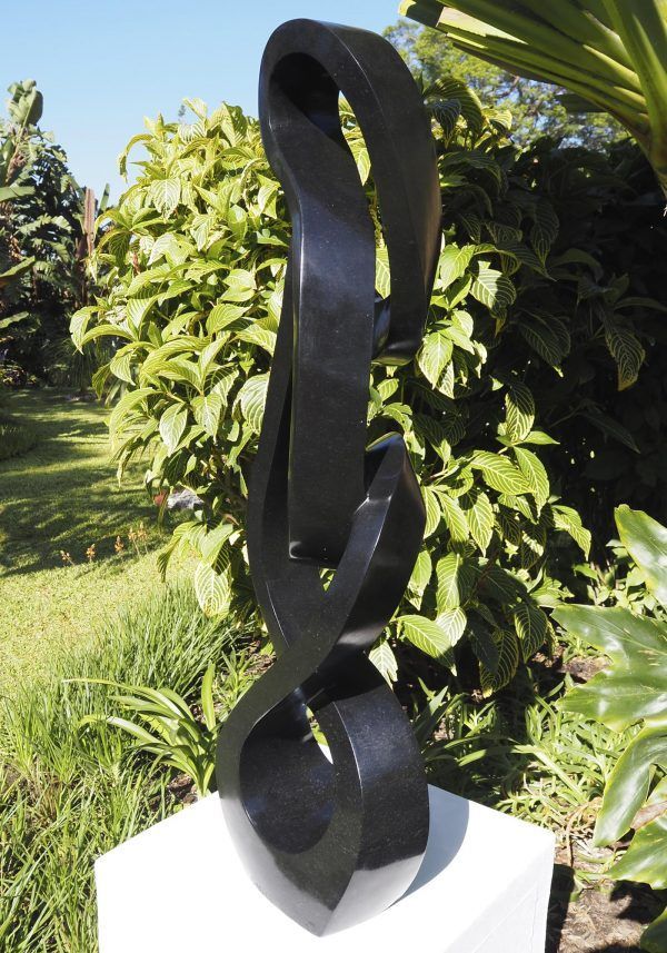 Abstract Shona sculpture Nuclear Family by Charles Kowo - back right
