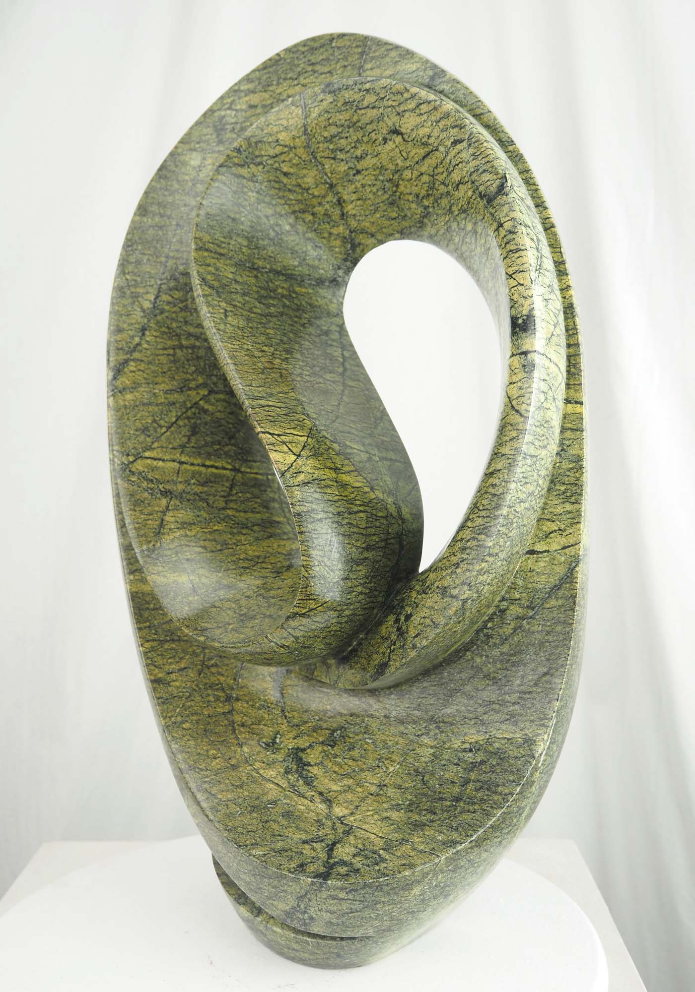 Abstract green stone Zimbabwean sculpture Skipping Rope by Willard Bopoto - front right