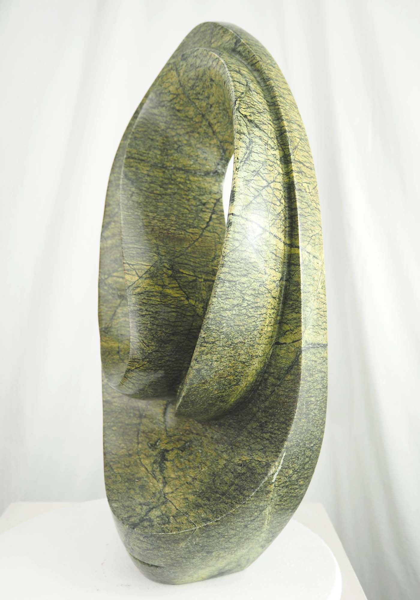 Abstract green stone Zimbabwean sculpture Skipping Rope by Willard Bopoto - right side