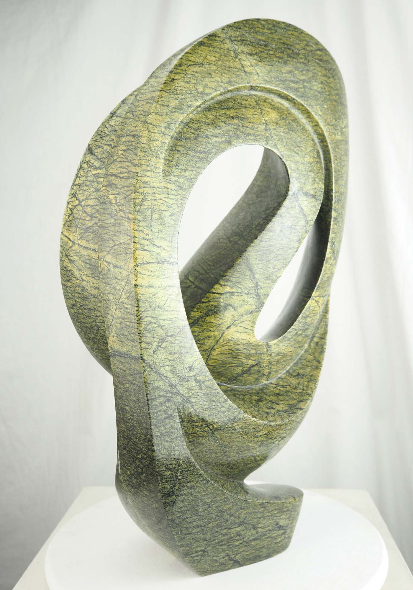 Abstract green stone Zimbabwean sculpture Skipping Rope by Willard Bopoto - back left