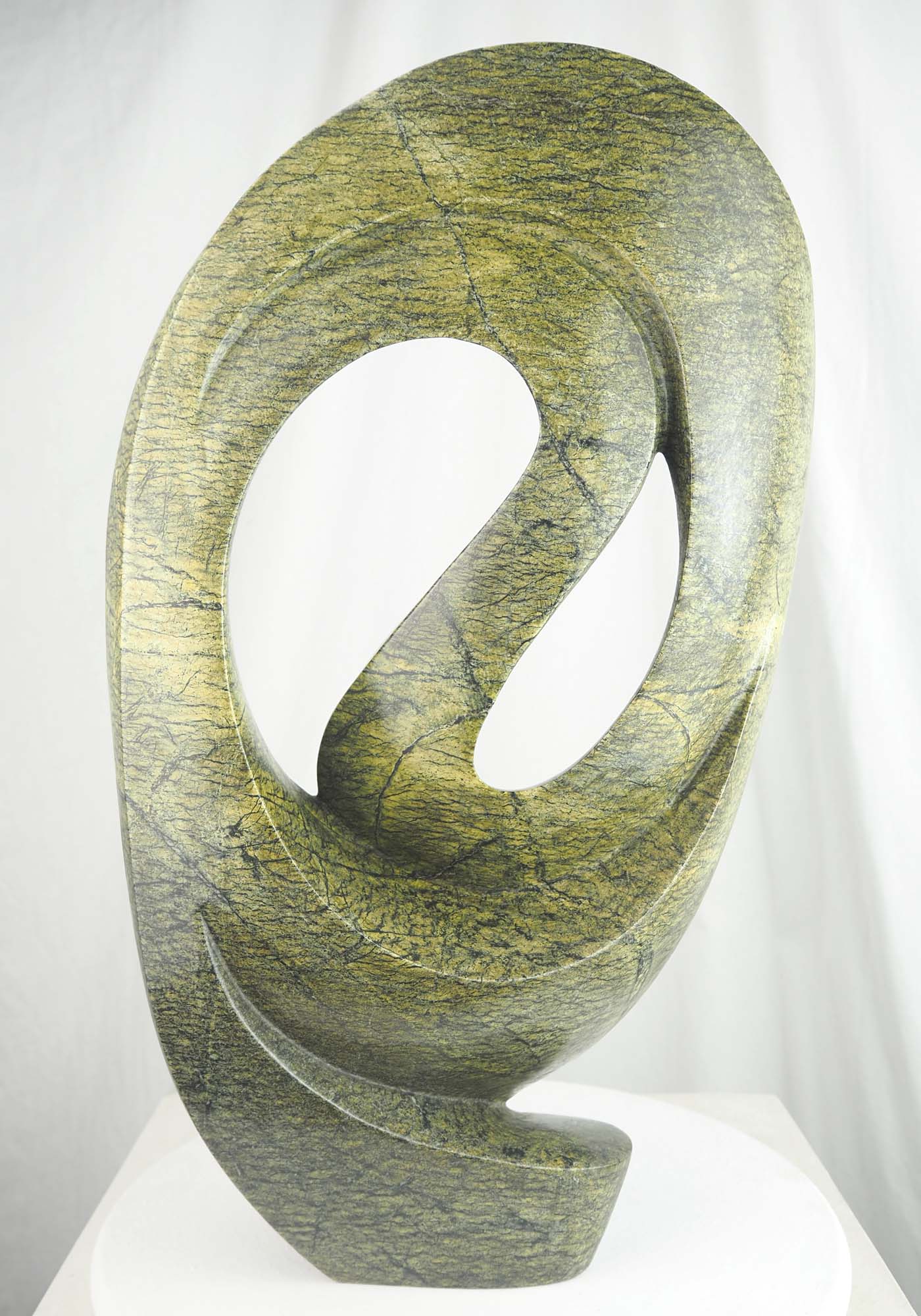 Abstract green stone Zimbabwean sculpture Skipping Rope by Willard Bopoto - back