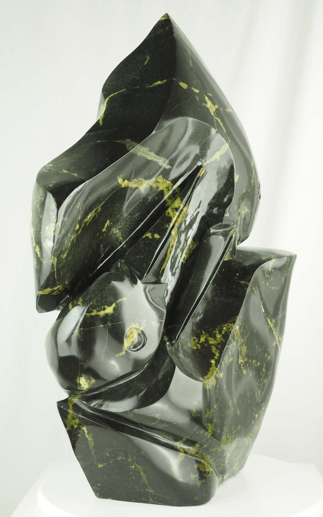 Shona stone sculpture of a bird - Strengthening Bond by Tago Tazvitya - front left