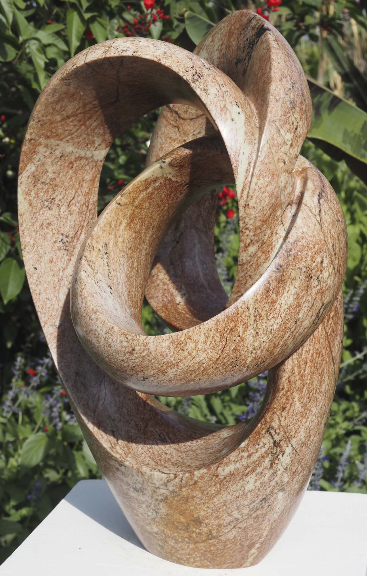 Contemporary abstract Shona stone sculpture - Best Wishes by Willard Bopoto - front right