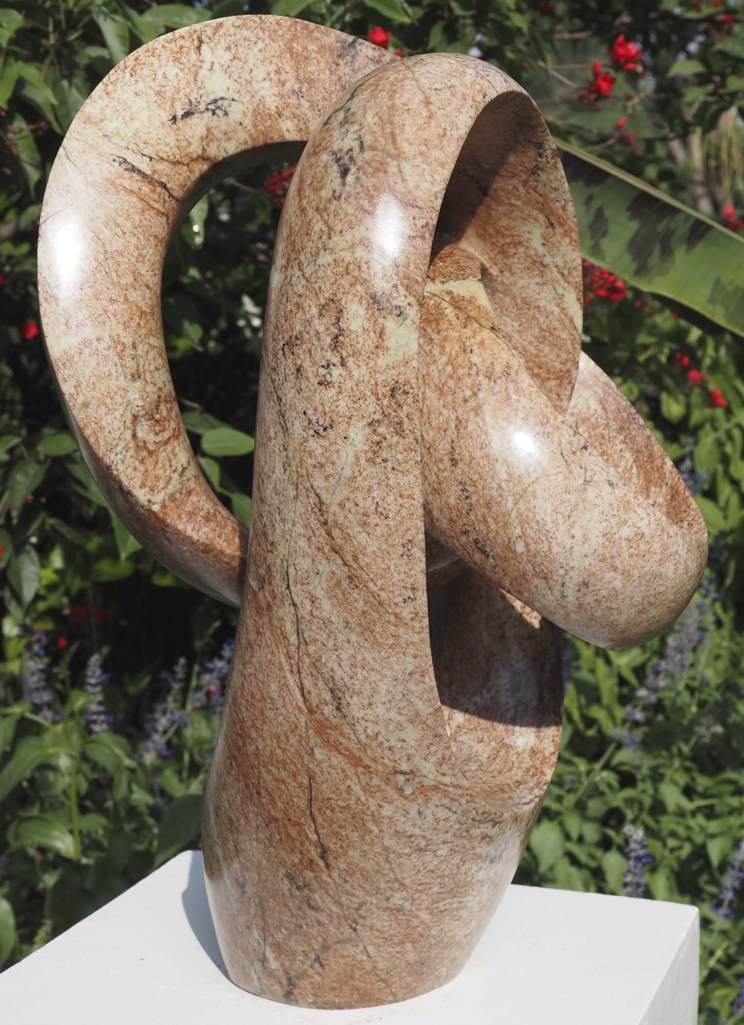 Contemporary abstract Shona stone sculpture - Best Wishes by Willard Bopoto - left side