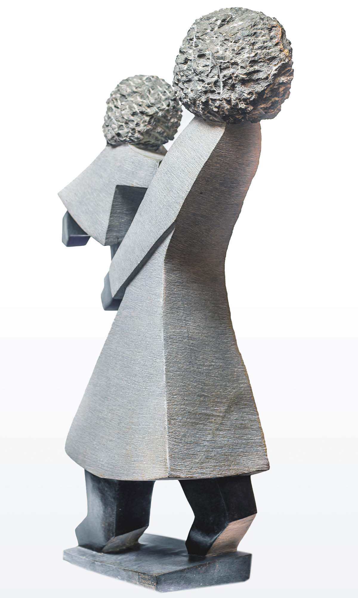 Shona stone sculpture mother and child by famous artist Dominic Benhura from Zimbabwe - back right