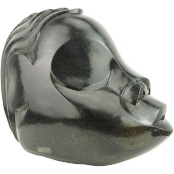 Stylized head by master Zimbabwean artist - Munyai by Nicholas Mukomberanwa - main image