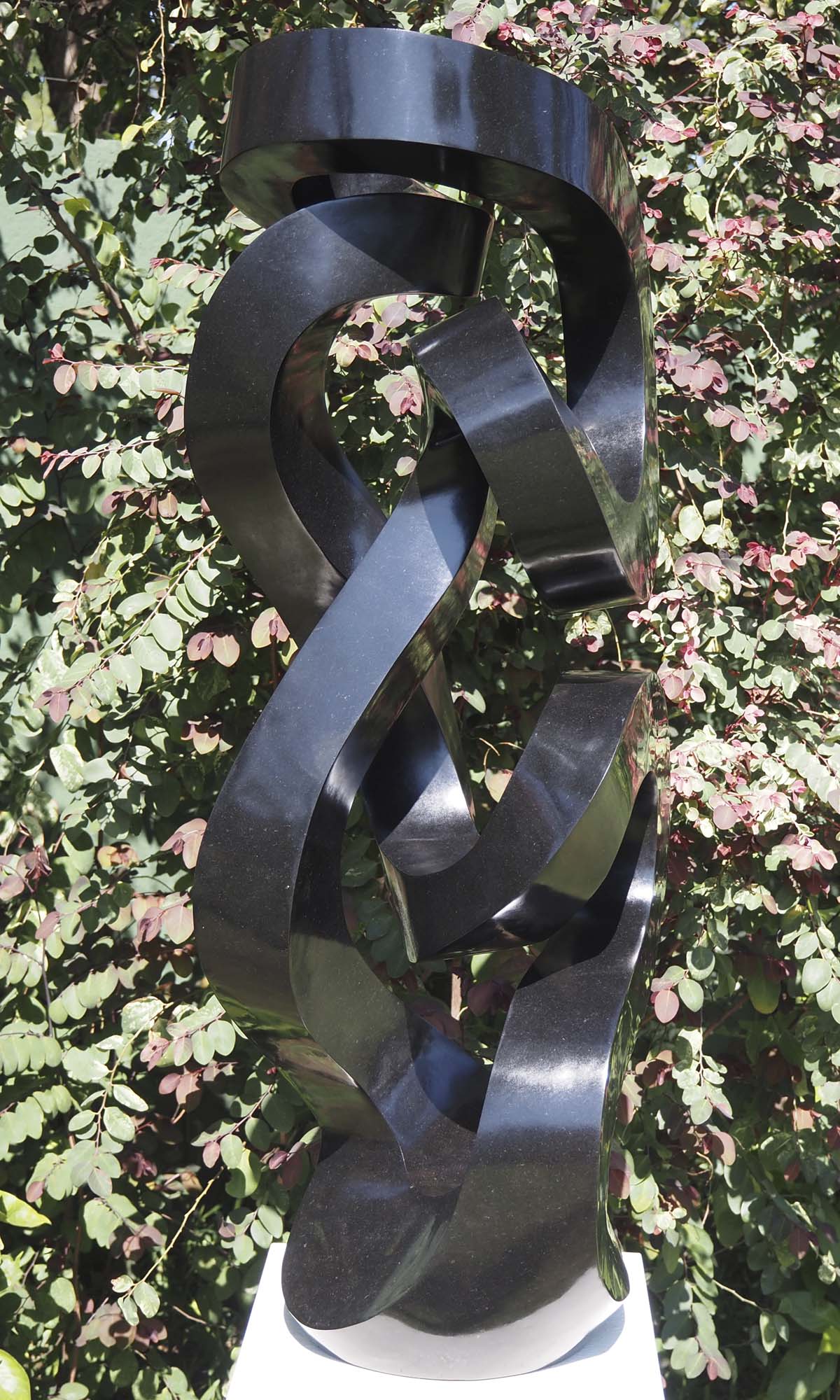 Garden art ornament sculpture - Real Life by Charles Kowo - left side