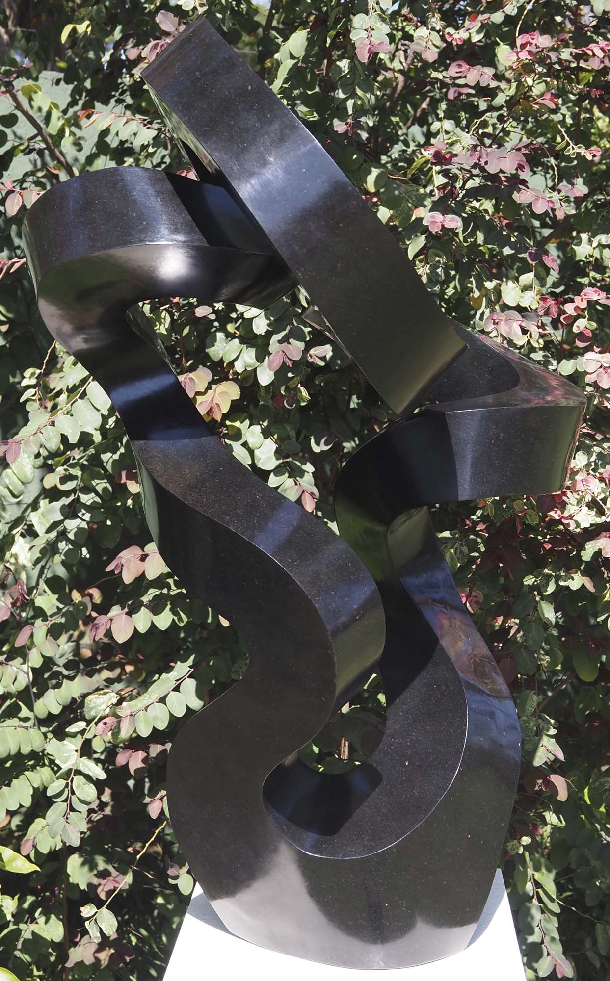 Original affordable stone sculpture - Water Lily by Charles Kowo - front left