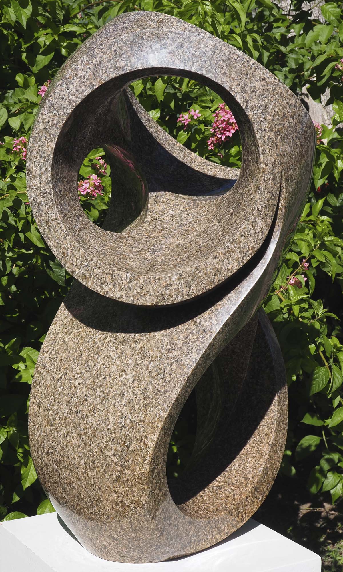 Outdoor abstract granite sculpture - Family Together by Munyaradzi Jeche - back left