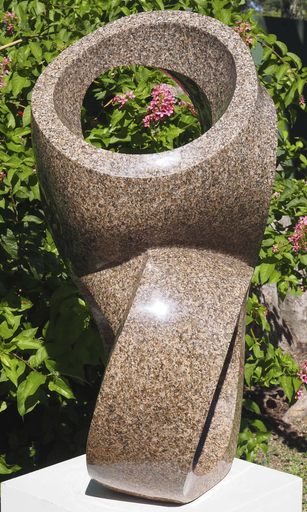 Outdoor abstract granite sculpture - Family Together by Munyaradzi Jeche - left side