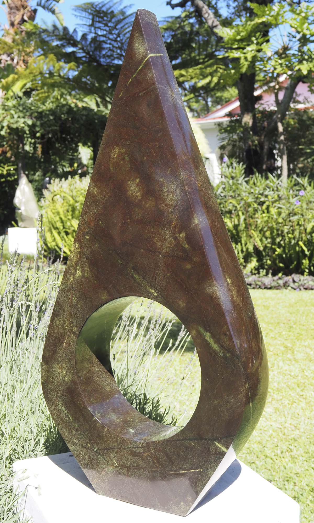 Contemporary African art sculpture - United Marriage by Nesbert Mukomberanwa - side 1 from right