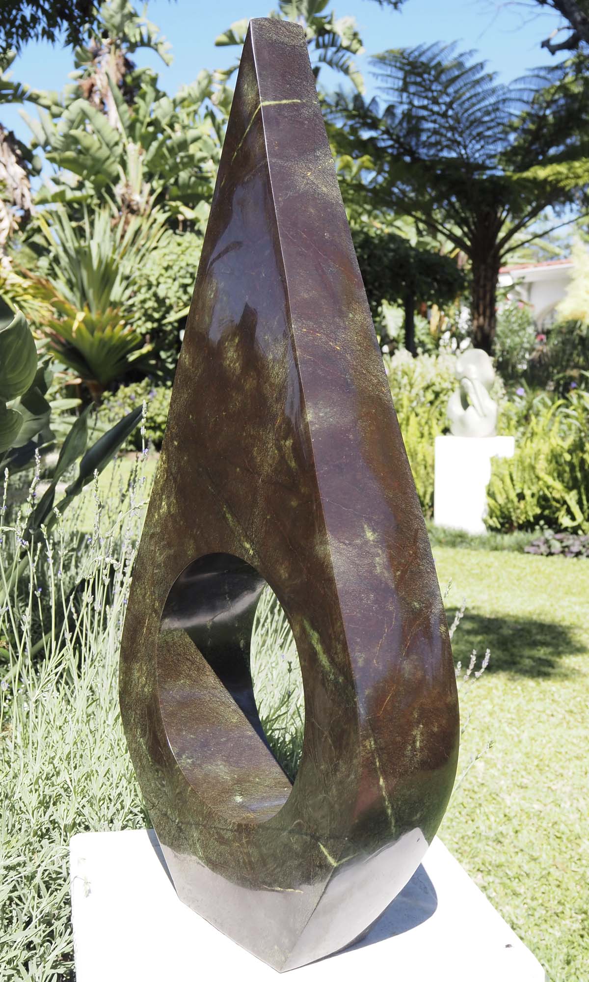 Contemporary African art sculpture - United Marriage by Nesbert Mukomberanwa - right side
