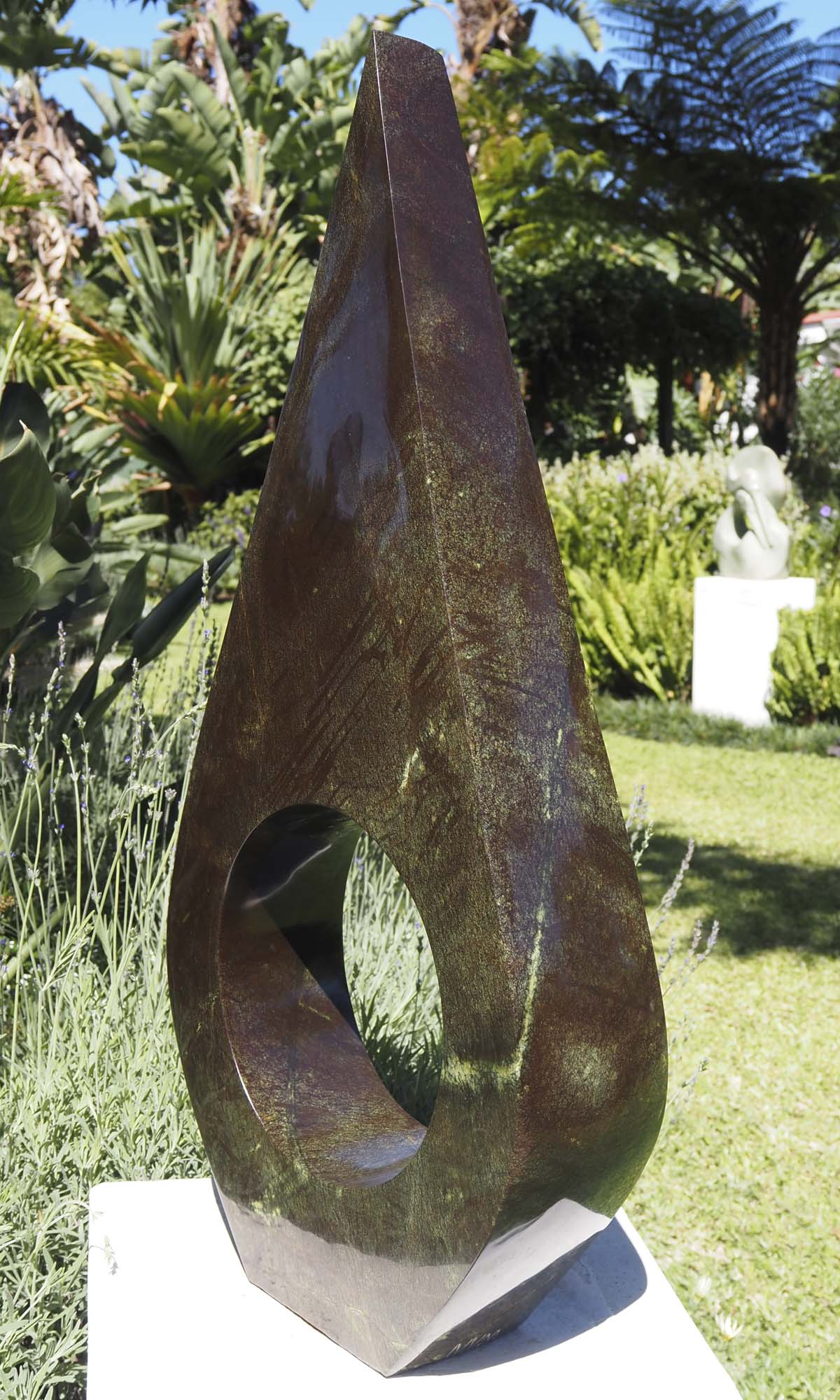Contemporary African art sculpture - United Marriage by Nesbert Mukomberanwa - side 2 from right