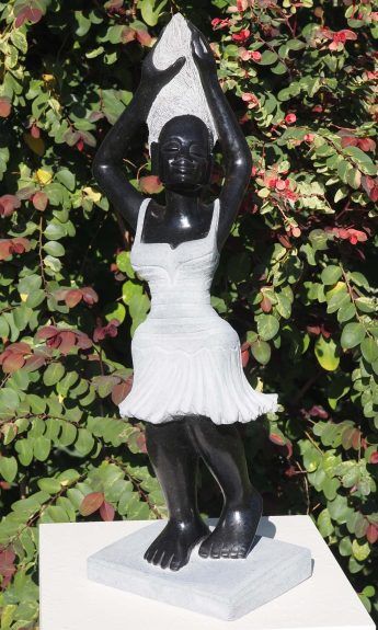 Shona stone sculpture of a girl - Doing My Hair by Rufaro Murenza - main image