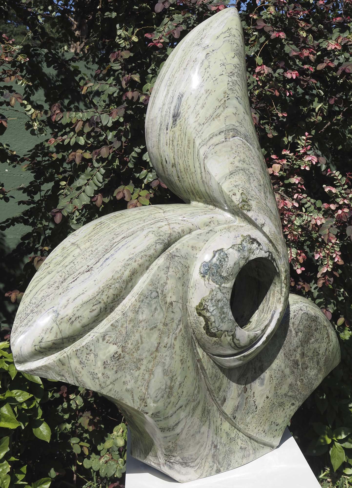 UK garden outdoor flower sculpture feature - Brighter Days by Tendai Gwaravaza - back left