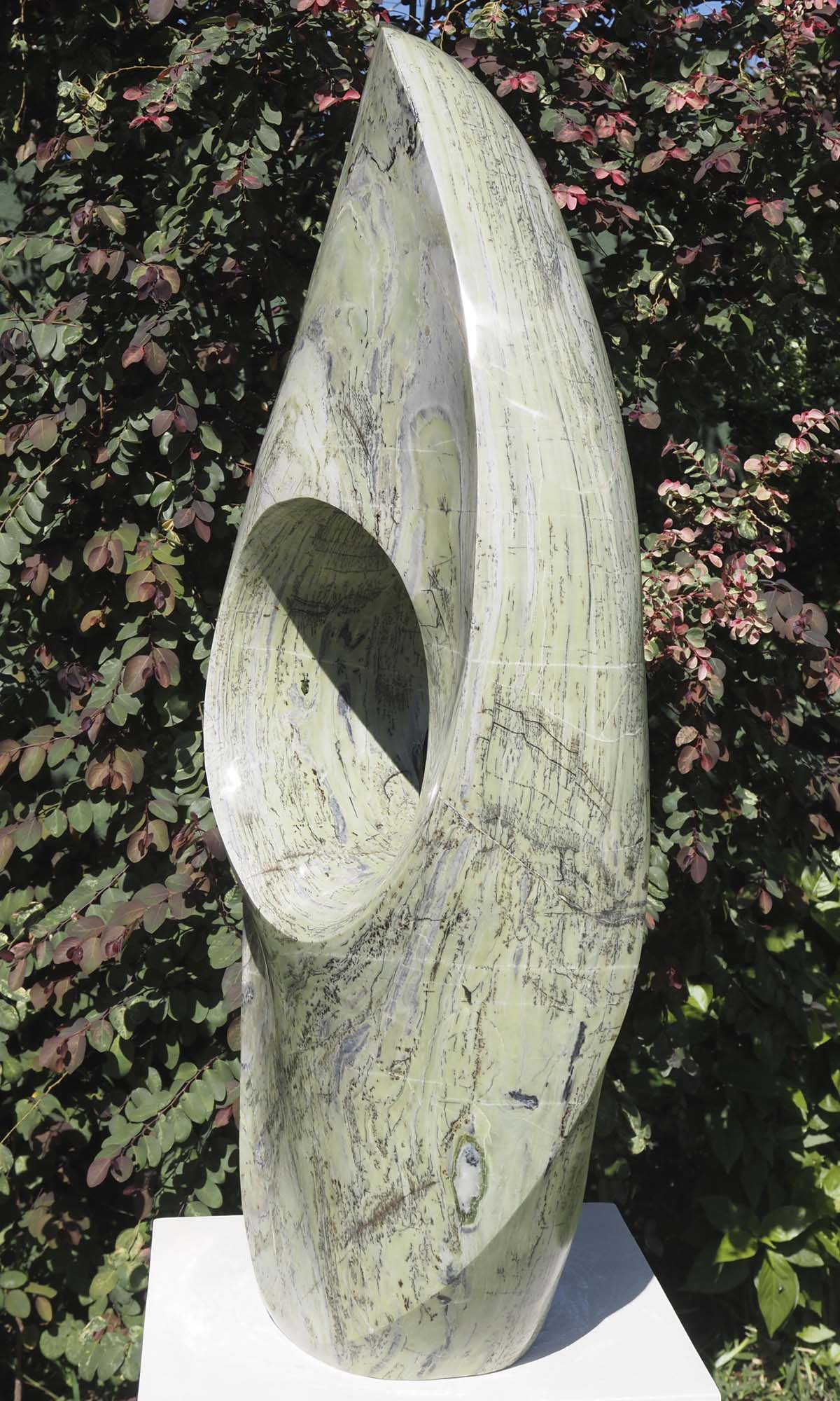 Round pale light outdoor garden sculpture - Soul Searching by Tendai Gwaravaza - right side
