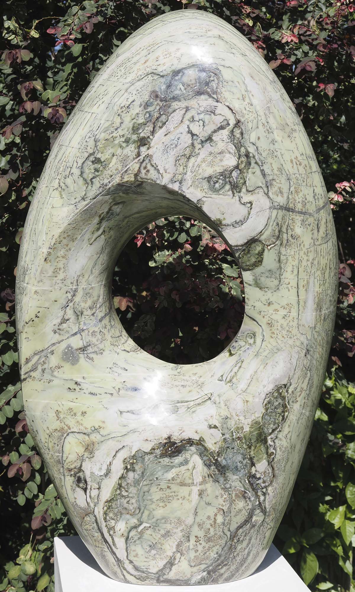Round pale light outdoor garden sculpture - Soul Searching by Tendai Gwaravaza - back