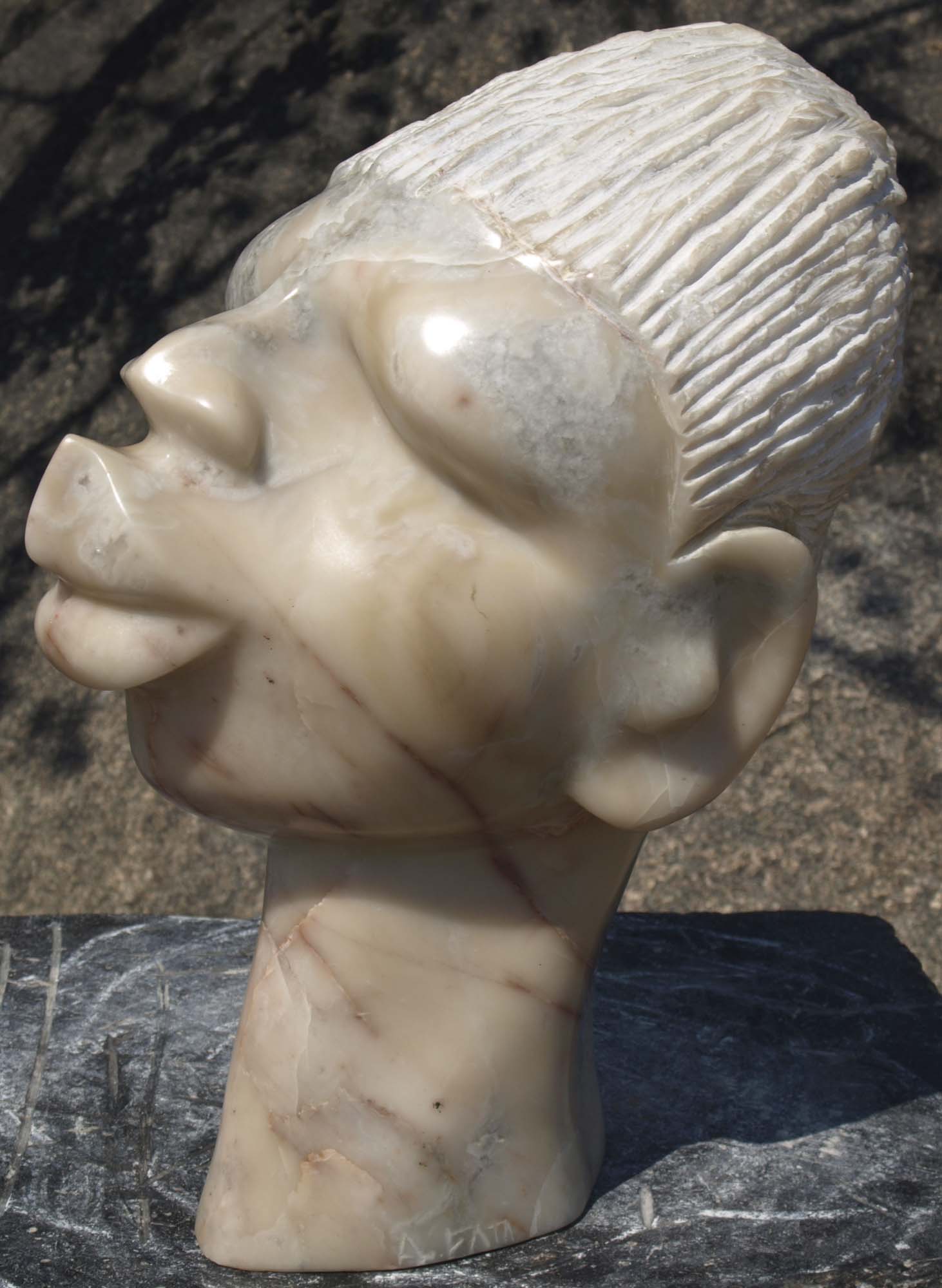 Marble sculpture stone head - Portrait Of Tendai by Zimbabwean artist Arthur Fata - front right