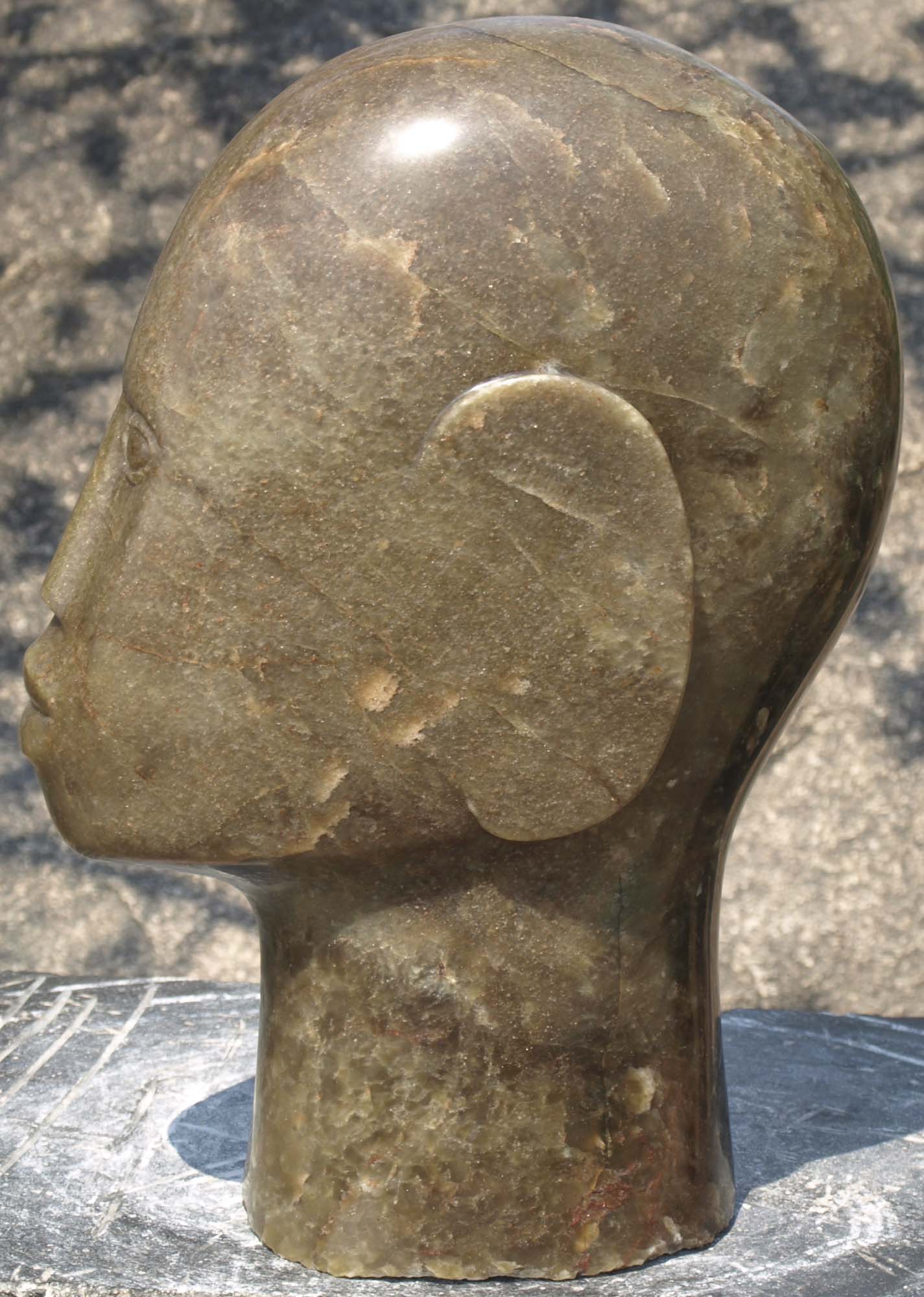 Self portrait original stone sculpture - Shona Head by famous Zimbabwean artist Sylvester Mubayi - right side