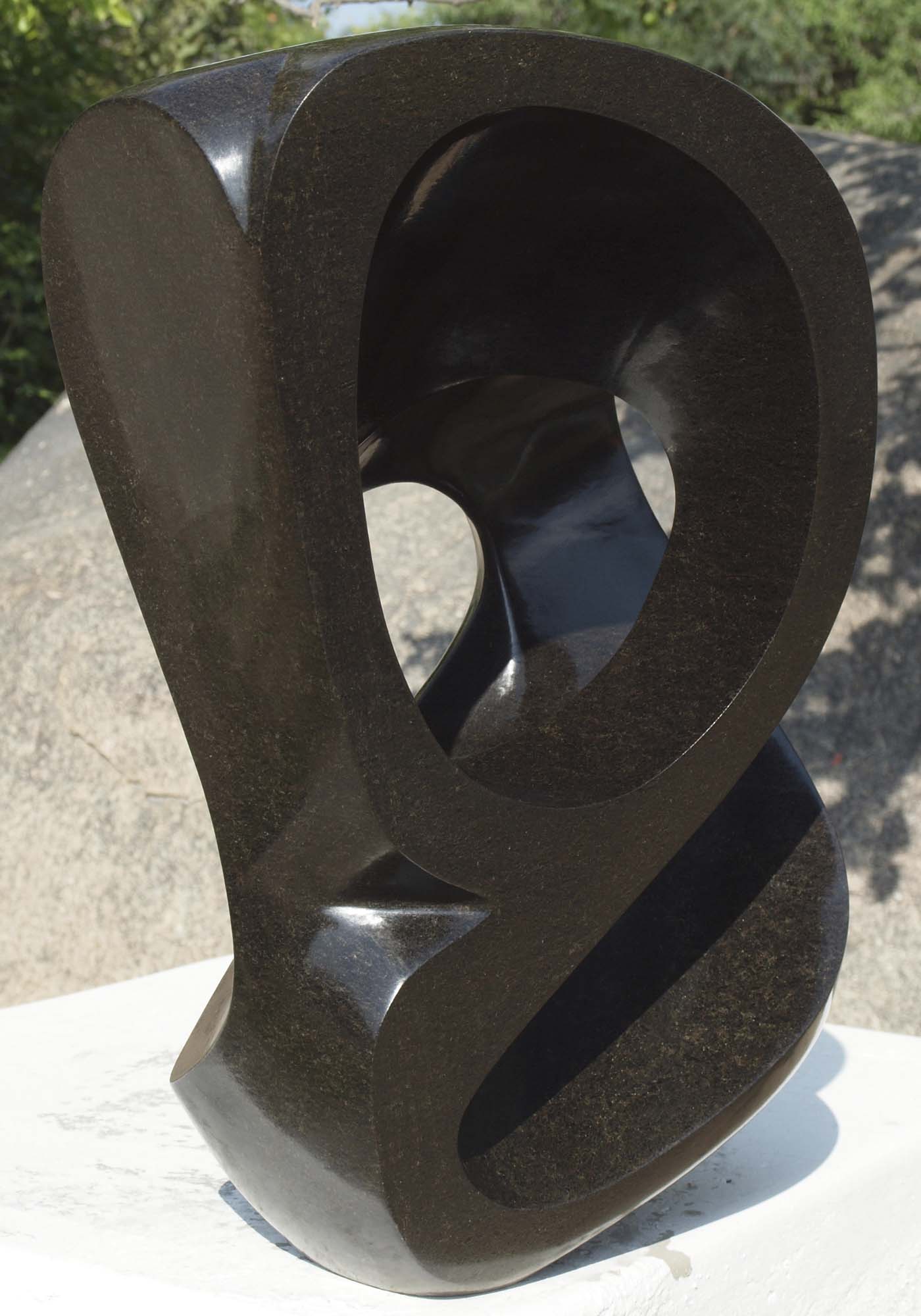 Contemporary stone sculpture - Mediator by African artist Munyaradzi Jeche - left side