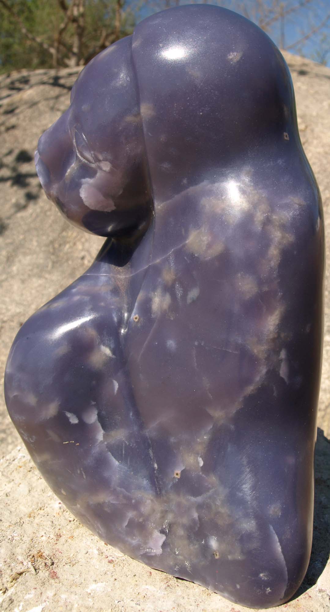 Purple stone lepidolite sculpture Paying Attention by Zimbabwean artist Sylvester Mubayi - right side