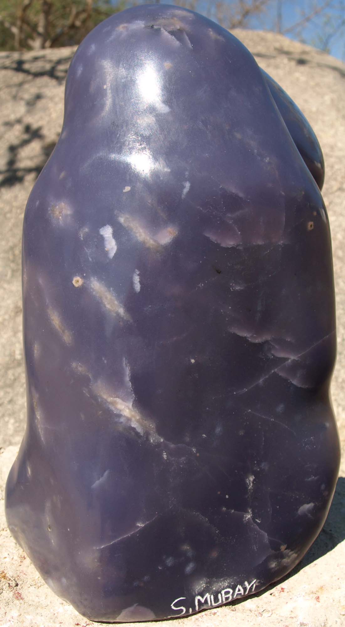 Purple stone lepidolite sculpture Paying Attention by Zimbabwean artist Sylvester Mubayi - back