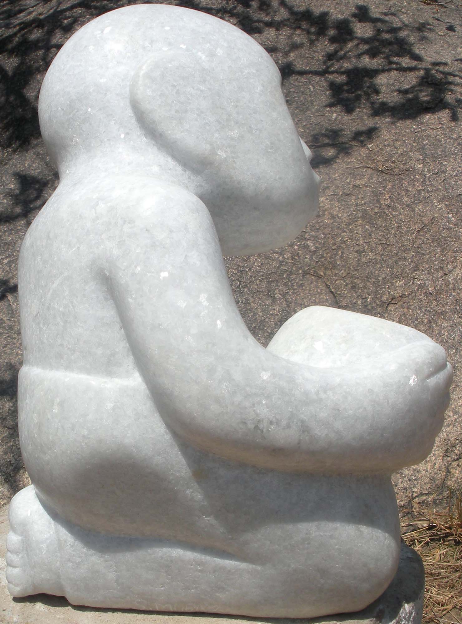 White marble Shona sculpture 'Bring You Some Food' by artist Sylvester Mubayi - back