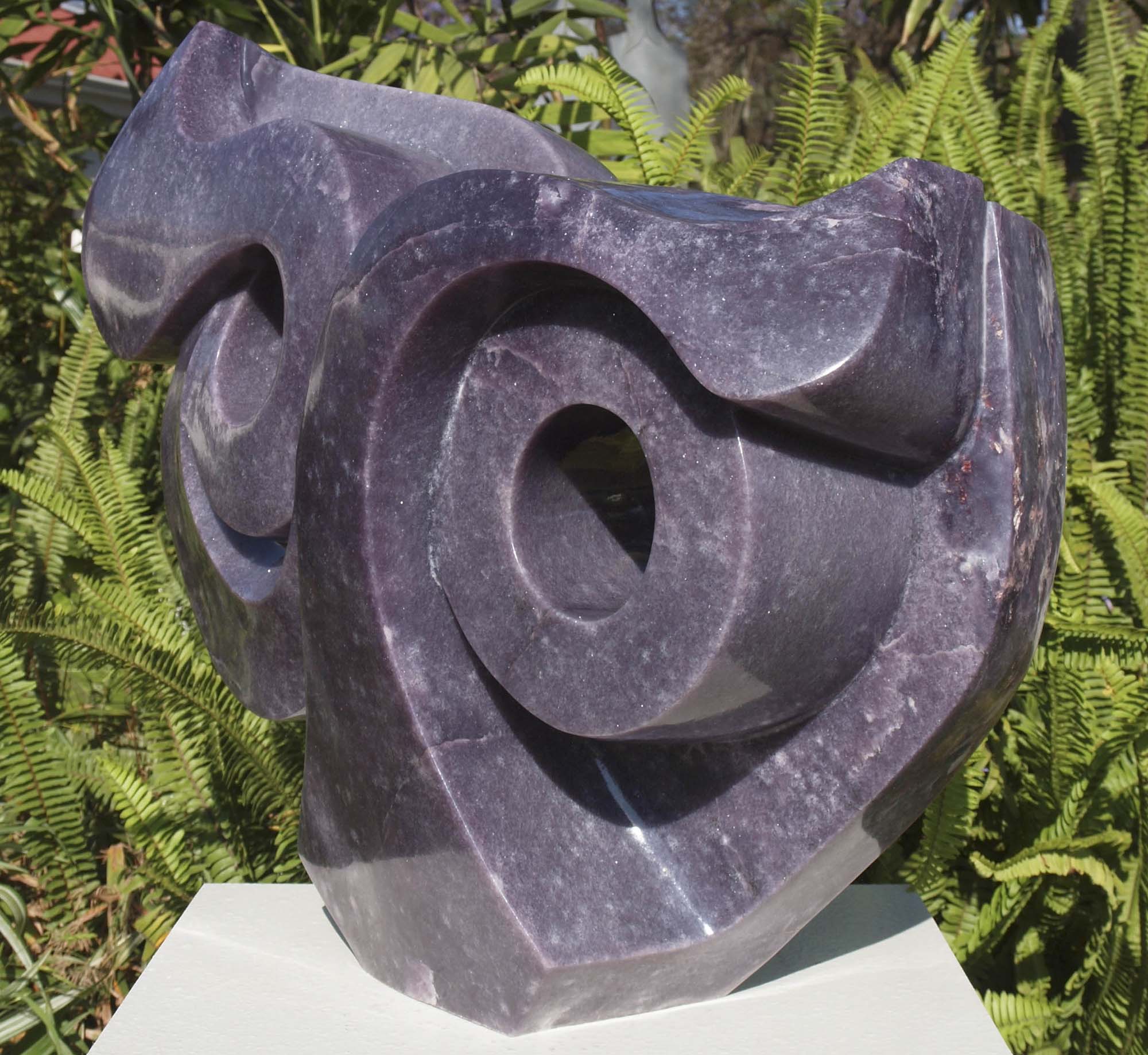 Purple stone abstract sculpture carved carving - Cat's Eyes in lepidolite by Ishmael Chitiyo from Zimbabwe - front right
