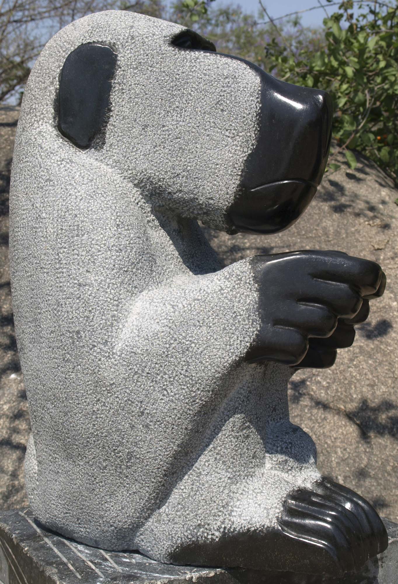 Animal wildlife nature stone sculpture - 'Grooming Baboon' by Sylvester Mubayi - left side