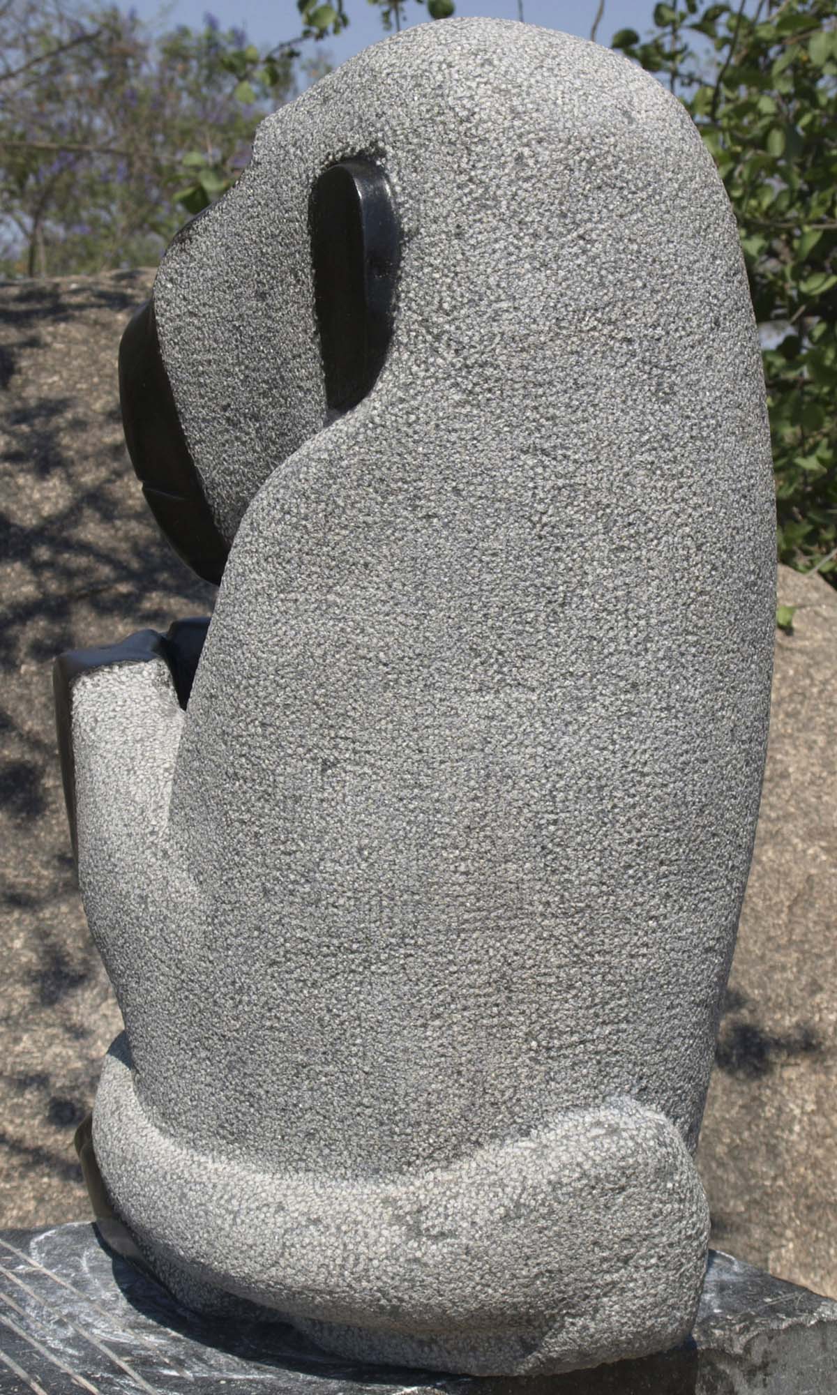 Animal wildlife nature stone sculpture - 'Grooming Baboon' by Sylvester Mubayi - back left