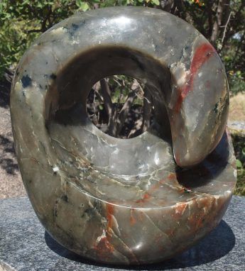 Colourful abstract stone sculpture - 'World In My Hands' by Tanyanyiwa Nyandoro - main image