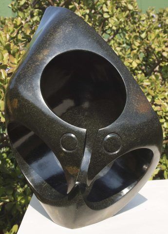 Abstract bird Zimbabwe stone sculpture - Listening Birds by Nesbert Mukomberanwa - main image