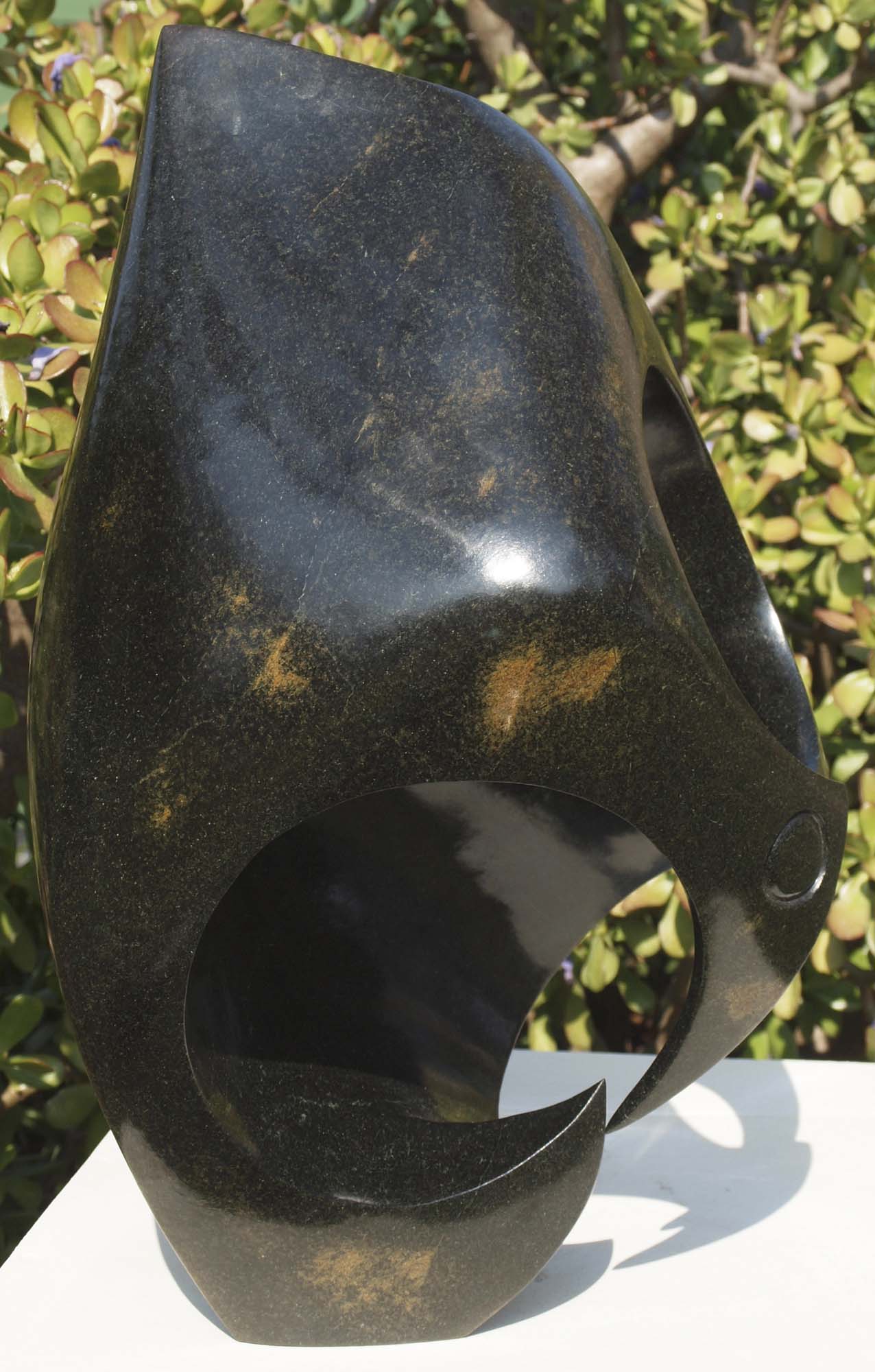 Abstract bird Zimbabwe stone sculpture - Listening Birds by Nesbert Mukomberanwa - left side