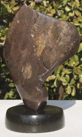 Affordable art small stone head - Paying Attention by Nesbert Mukomberanwa from Zimbabwe - main image