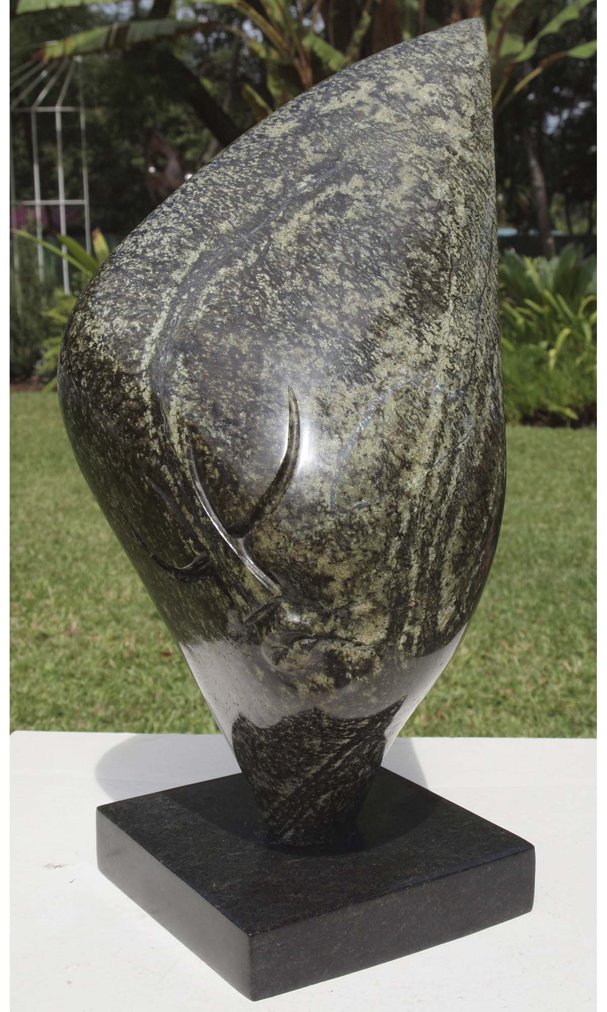 Original affordable stone sculpture with base - Relaxing Head by Nesbert Mukomberanwa from Zimbabwe - front right