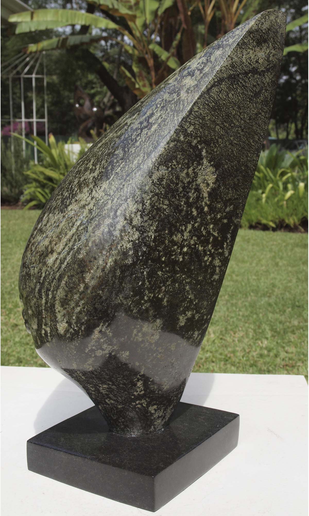 Original affordable stone sculpture with base - Relaxing Head by Nesbert Mukomberanwa from Zimbabwe - right side