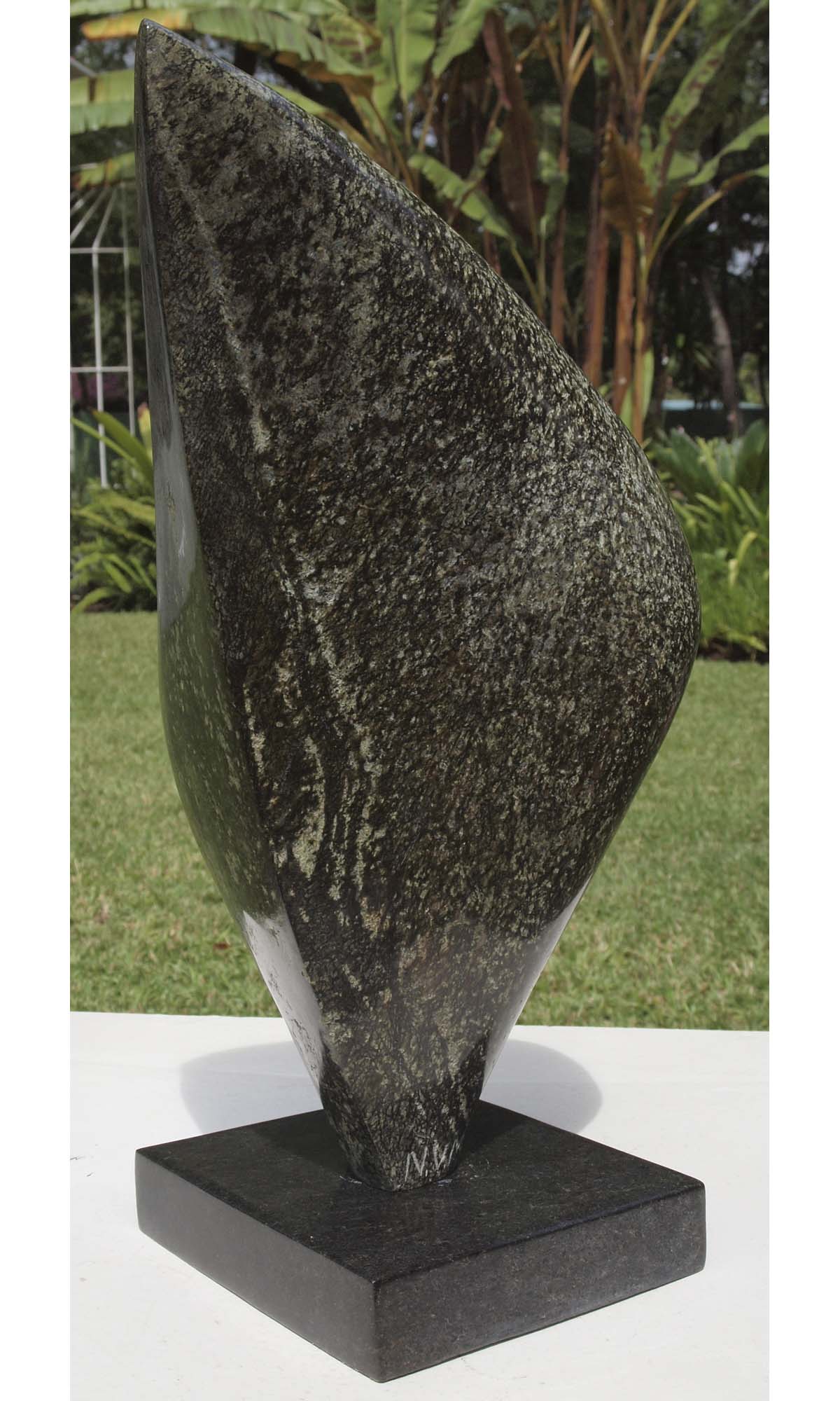 Original affordable stone sculpture with base - Relaxing Head by Nesbert Mukomberanwa from Zimbabwe - back