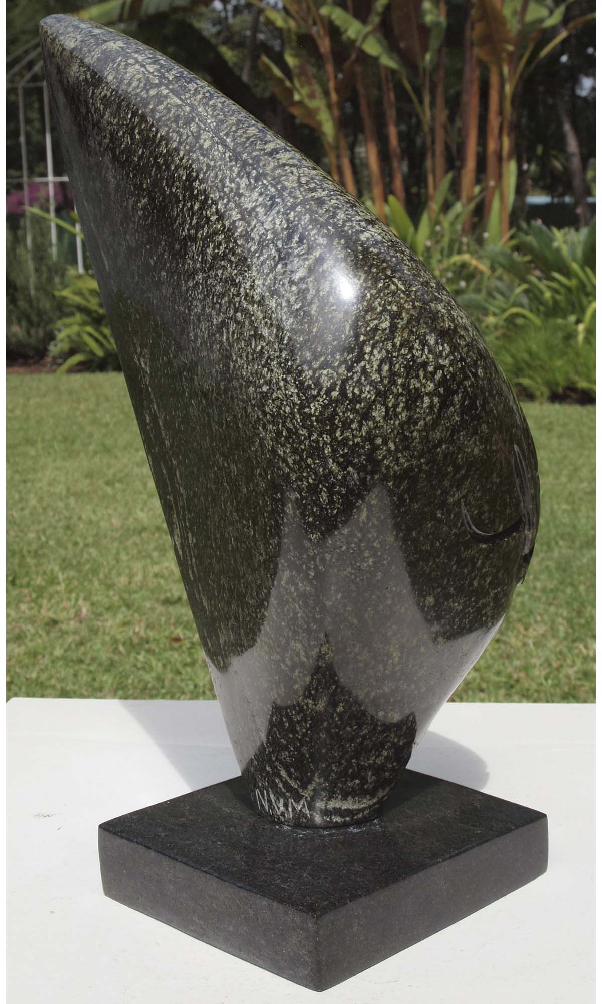 Original affordable stone sculpture with base - Relaxing Head by Nesbert Mukomberanwa from Zimbabwe - left side