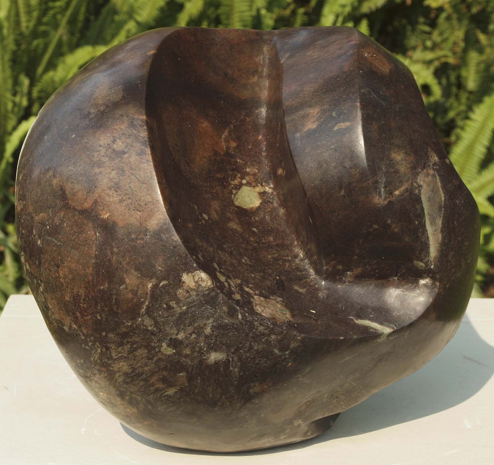 Affordable abstract purple stone sculpture - Personal Transformation by Tanyanyiwa Nyandoro - left side
