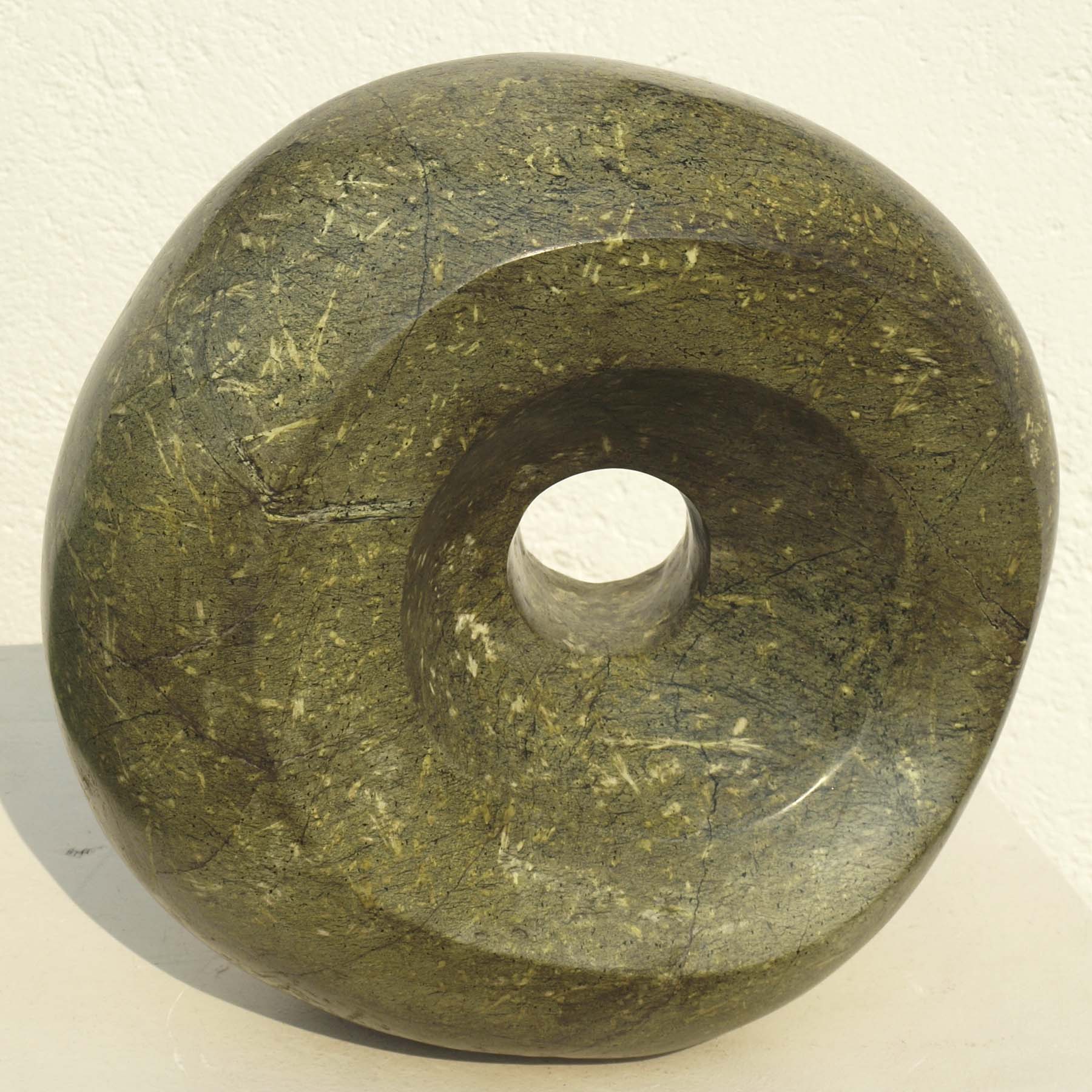 Abstract sculpture affordable art round green - On Top Of Things by Tanyanyiwa Nyandoro - front from above