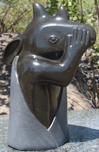 Rhino sculpture art carving - I'm Thinking Of Something by Sylvester Mubayi - left side