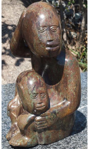 Stone sculpture of children - 'What Shall We Do?' by Sylvester Mubayi - front