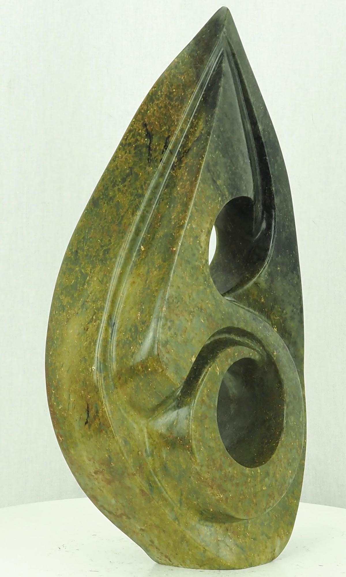 Unique African art stone carving - Humble Beginnings by Antony Masamba - front left