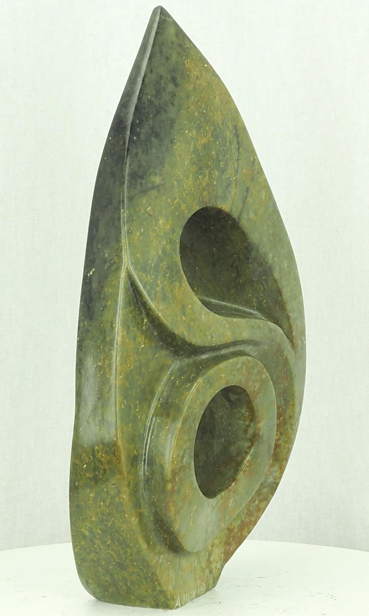 Unique African art stone carving - Humble Beginnings by Antony Masamba - back left