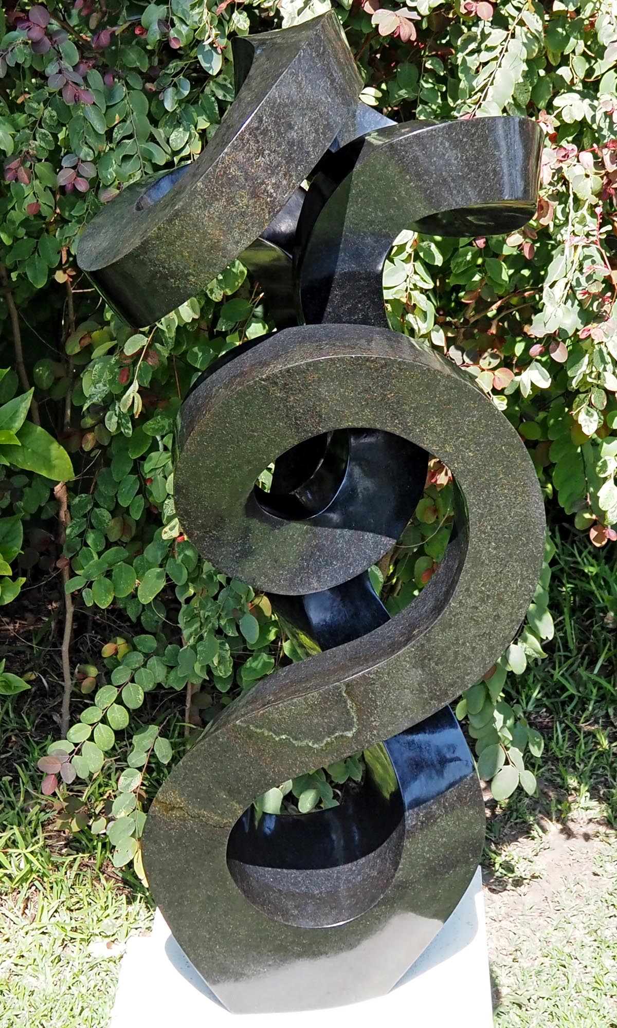 Unique UK stone garden sculpture centrepiece - Caring Mother by Charles Kowo - front from above