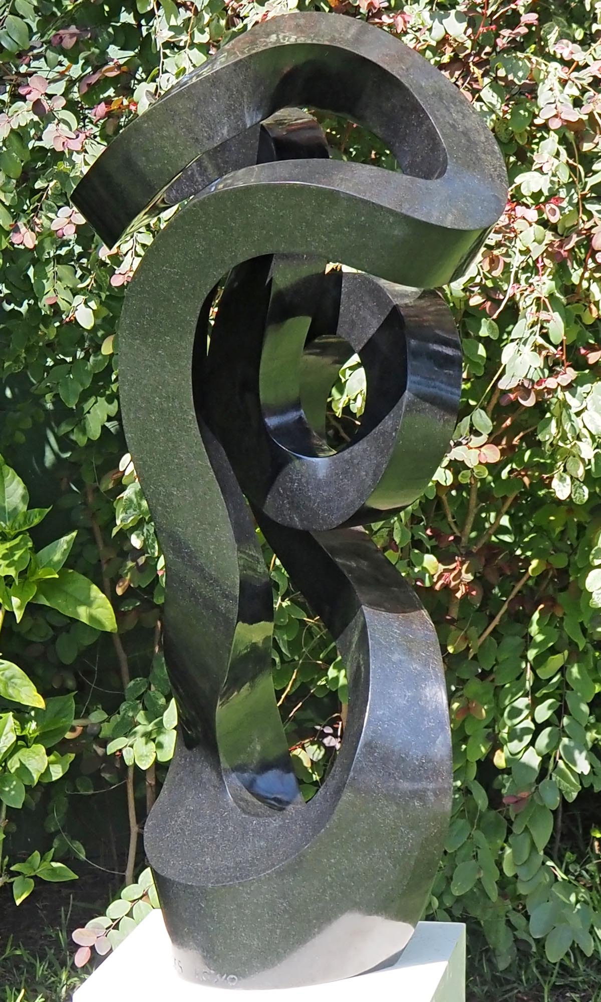 Unique UK stone garden sculpture centrepiece - Caring Mother by Charles Kowo - back right