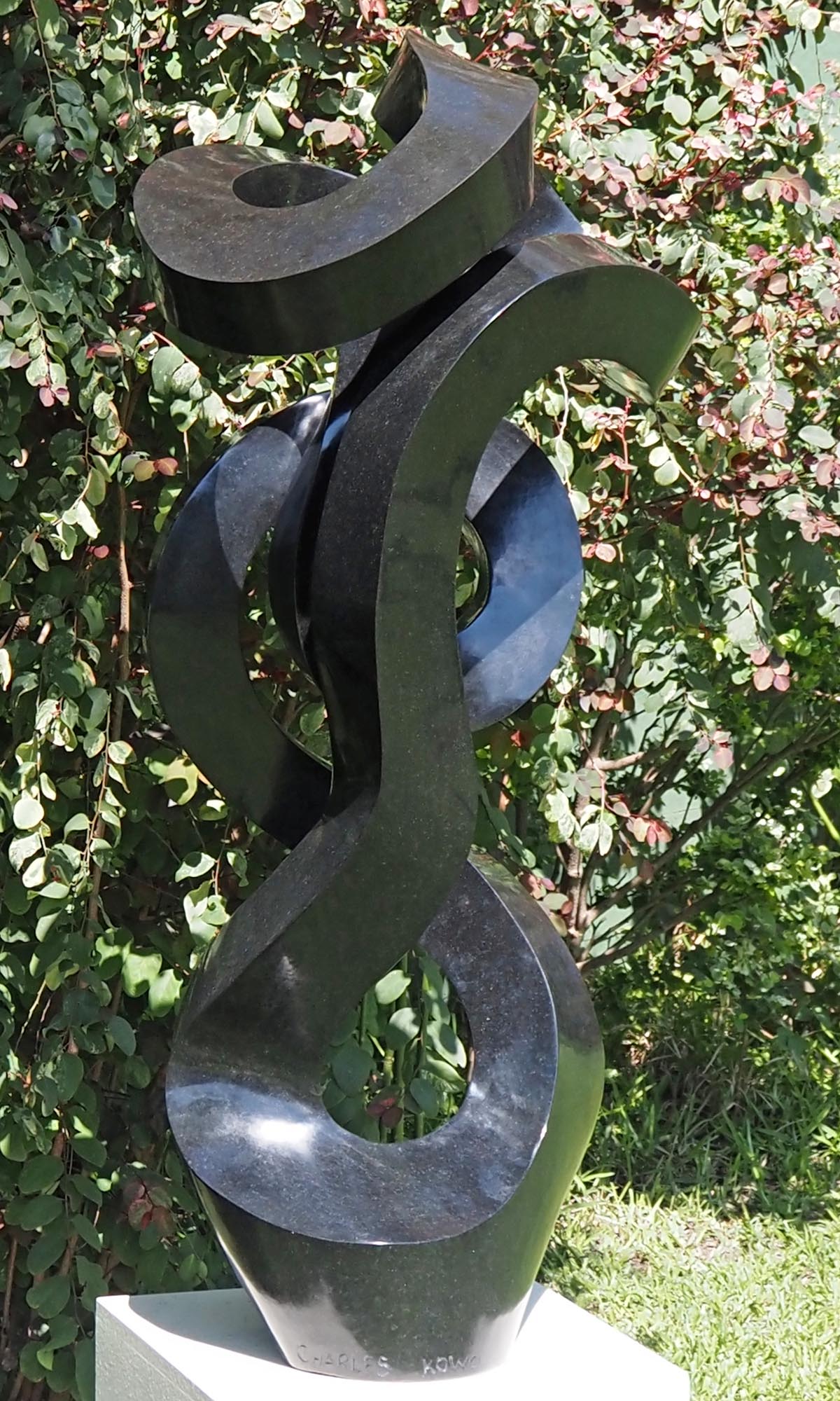 Unique UK stone garden sculpture centrepiece - Caring Mother by Charles Kowo - back