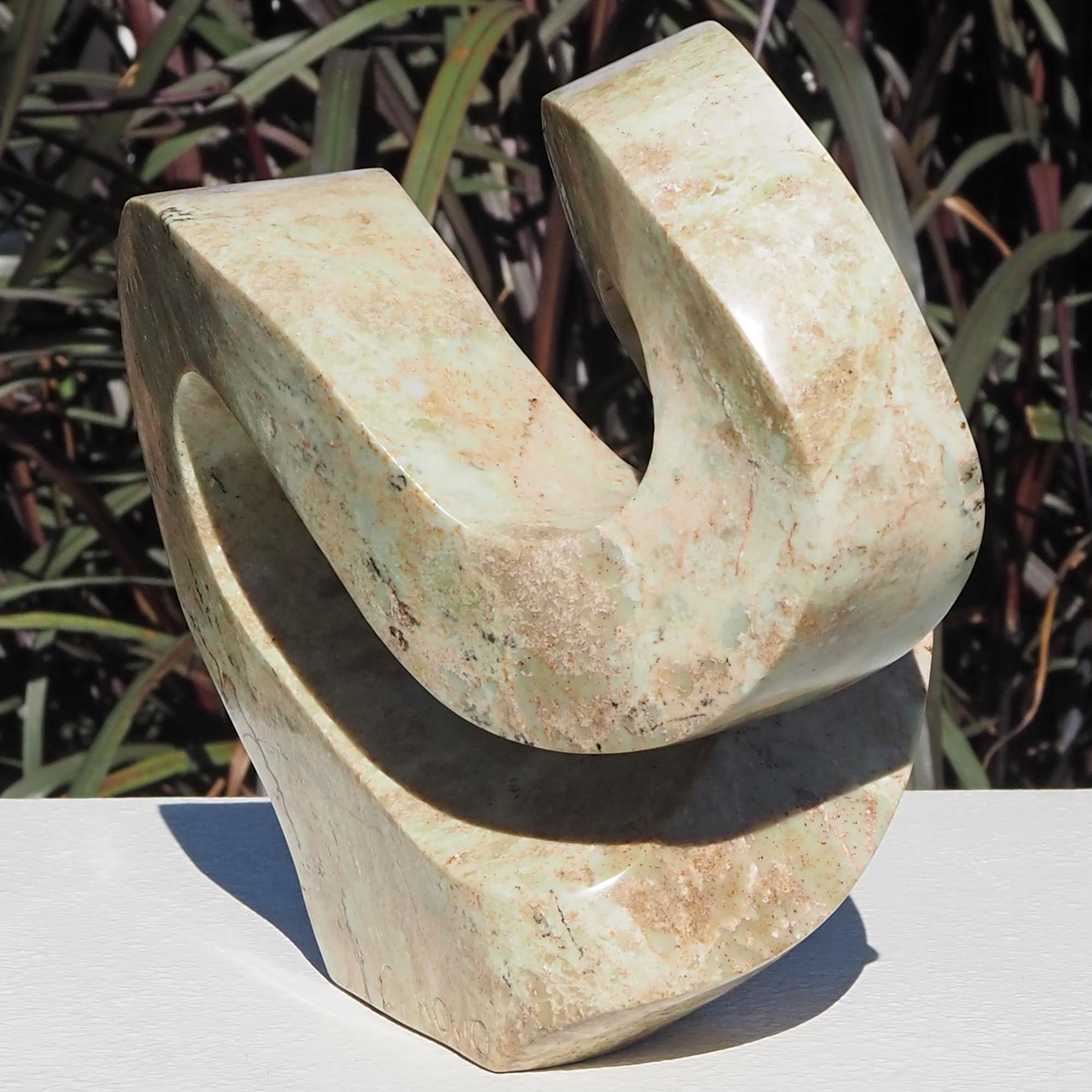 Pink stone stone sculpture original carving - Follow Me by Charles Kowo - back right