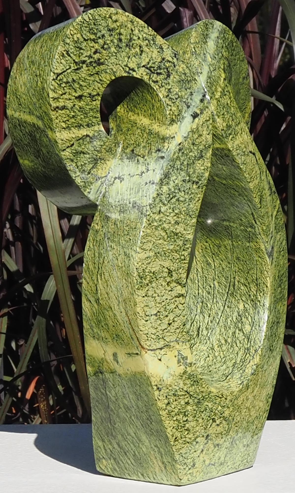 Green stone owl sculpture carving - Wise Bird by Charles Kowo - left side